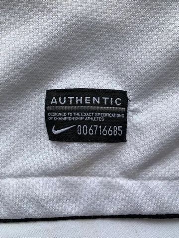 fake nike shirts|nike authenticity check clothing.